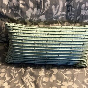 Pale green beaded pillow